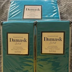 Teal queen sheet set and 4 additional standard pillowcases.